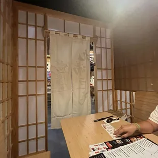 Other view of curtained, private booths/sections/seating