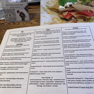 Menu with some of the eaten nachos in the back.. lol