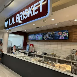 Shop front in lower food court next to Roots &amp; Greens...
