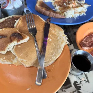 Pancakes Mexican omelette with hash browns and toast.
