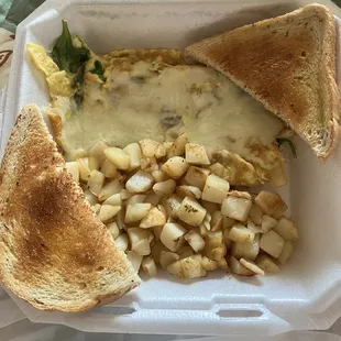 Popeye Scromelette (spinach, mushrooms and Swiss cheese) Diced potatoes with rye toast