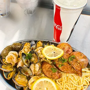  a plate of seafood and pasta
