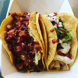 The Porky Pig Taco on corn and the Fiesta Lime Chicken Taco on corn