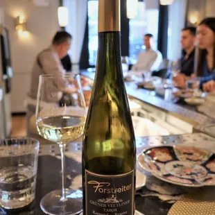 a bottle of wine on a table