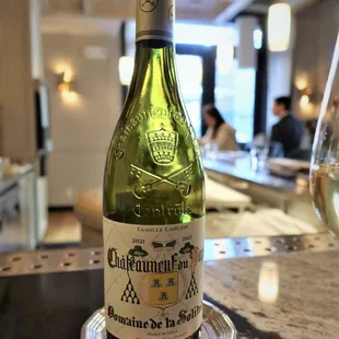 a glass of wine on a table