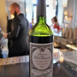 a bottle of wine on a table