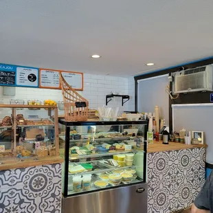 a man sitting in front of the counter