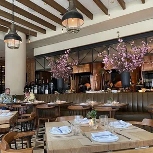 a restaurant with tables and chairs