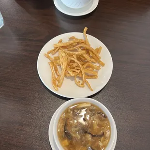 Wonton Soup and hot and Sour Soup with crispy wontons