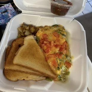 Egg white veggie  scrambler order revealed before split.....homemade salsa included!