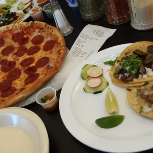 Steak taco, carnita taco and a pepperoni pizza!