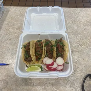 Delicious barbacoa tacos, with salsa en molcajete