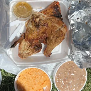 1/2 pit chicken order, comes with rice, beans, and salsa, highly recommend this