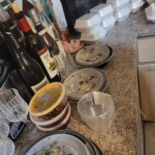  dirty dishes on counter