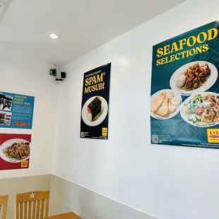 a restaurant wall with posters