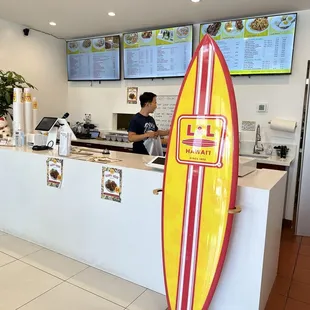 a surfboard in front of the counter