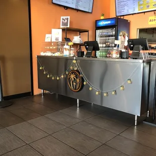 Counter where you order food Will bring to your table