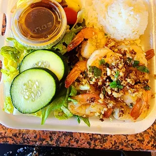 a meal in a styrofoam container