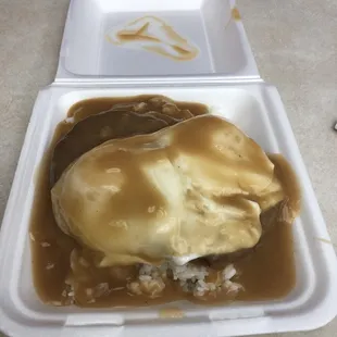 Loco Moco- 2 over easy eggs over two hamburger patties over a mountain of rice