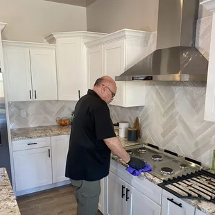Bringing brilliance to every kitchen, our residential cleaner meticulously restores the stove top to a pristine, gleaming state.