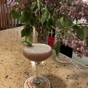 a cocktail in a glass on a table