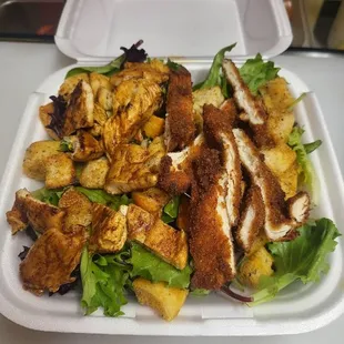 Cesar salad w/ cooked on the flat chicken and breaded chicken!