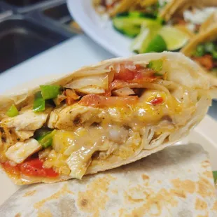 a chicken and vegetable burrito
