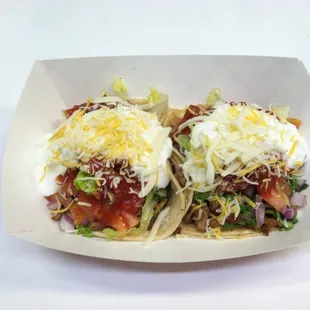 2 steak tacos. Not only affordable price but soooo much stuff on the tacos!