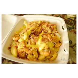 Shrimp and bacon cheese fries with sour cream. YUM!