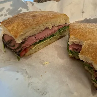 Freshly cut pastrami, arugula, fresh tomato, basil pesto