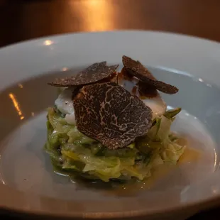 Leeks with truffle vinaigrette, poach egg topped with burgundy truffle