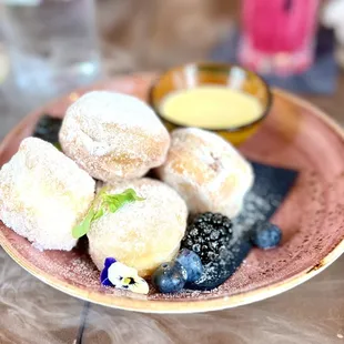 Bomboloni - donuts with vanilla custard. Delicious.