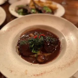 Bistro Coq au Vin in a Red Wine Sauce With Mashed Potatoes, Bacon, Pearl Onions