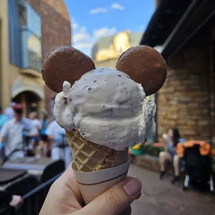 1 scoop of bueberry yogurt ice cream with macaron mickey ears!