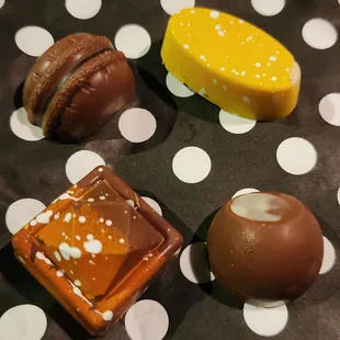 Clockwise: Hazelnut Praline, Yuzu, Coffee, Passionfruit from L&apos;Atelier TR (9/13/23)