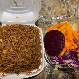 Rice that goes with legume and side salad that goes with fried fish.