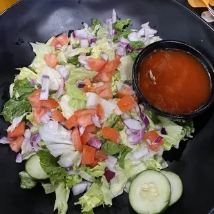 House salad- it&apos;s huge! With French dressing.