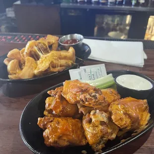 Buffalo wings and cheese fries