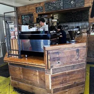 a man working behind the counter