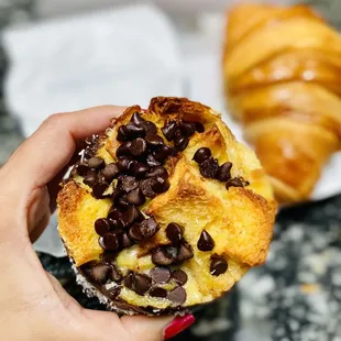 Grand-mere!The best!Flaky, crunchy,coconuty with soft goeey brioche center.Covered with chocolate shell &amp; chocolate chips!