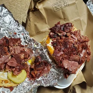 a roast beef sandwich and potato wedges