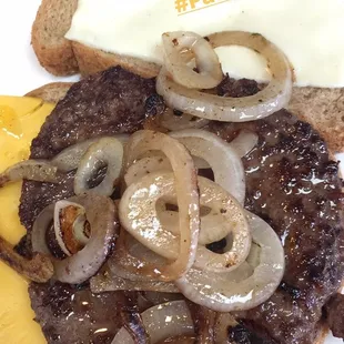 a sandwich with cheese and onions