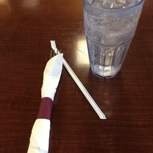 a toothbrush and a glass of water