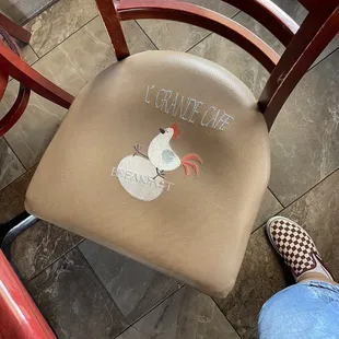 Each chair is adorably embroidered.