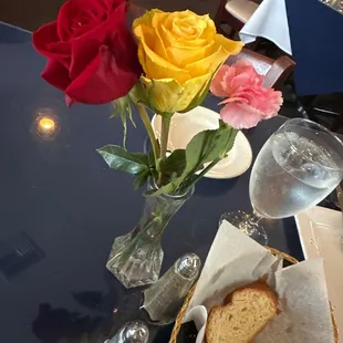 Beautiful fresh flowers and bread