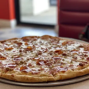 Meat Lovers Pizza medium which is ginormous