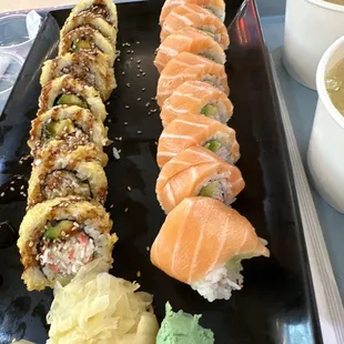 a plate of sushi and a bowl of soup