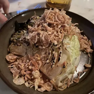 Grilled cabbage with lots of crispy shallots