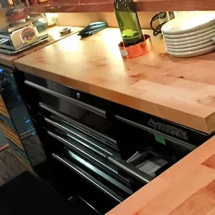 Commercial tool chest making up the base for the workspace at the counter.