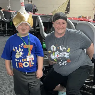 a man and a boy posing for a picture